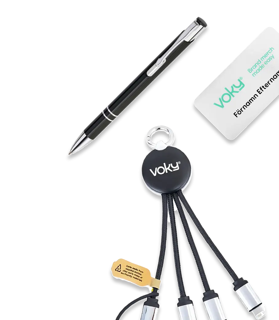 Voky-m&auml;rkt laddningskabel med flera kontakter, svart kulspetspenna och namnbricka.